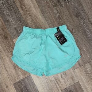 Nike dry fit running shorts, new size small mint green